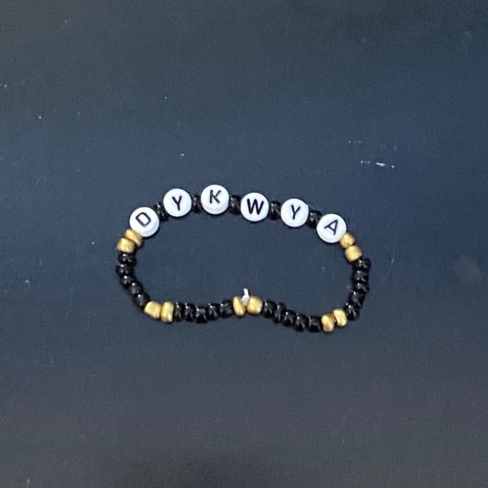 handmade "do you know who you are" beaded bracelet